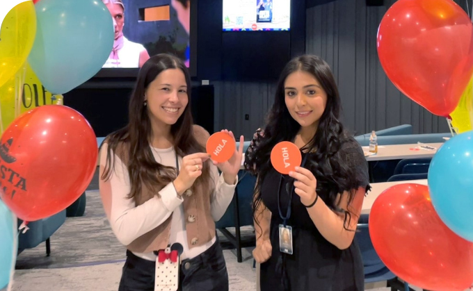 Three Fox Employees at a company Pride event